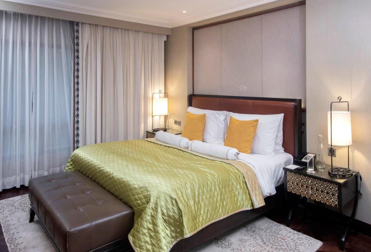 Hotel The Claridges Nueva Delhi Exterior foto A bedroom at the Taj Bengal