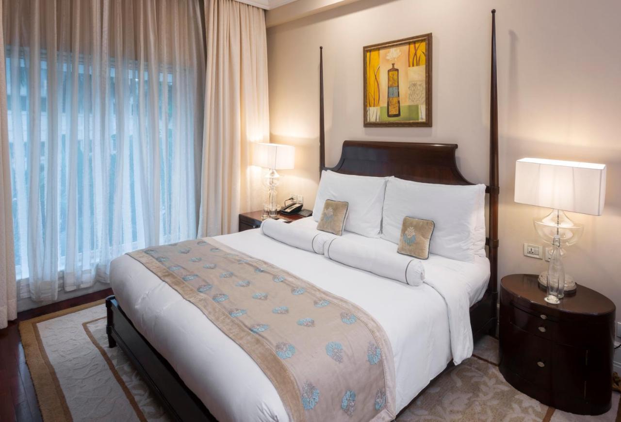 Hotel The Claridges Nueva Delhi Exterior foto A bedroom at the Taj Bengal